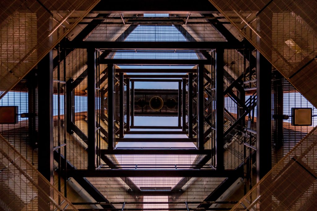 Photo looking upward into buidling scaffolding